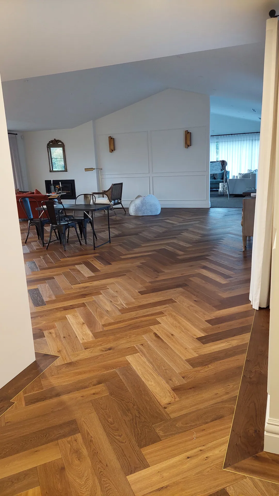Herringbone through an open living area.