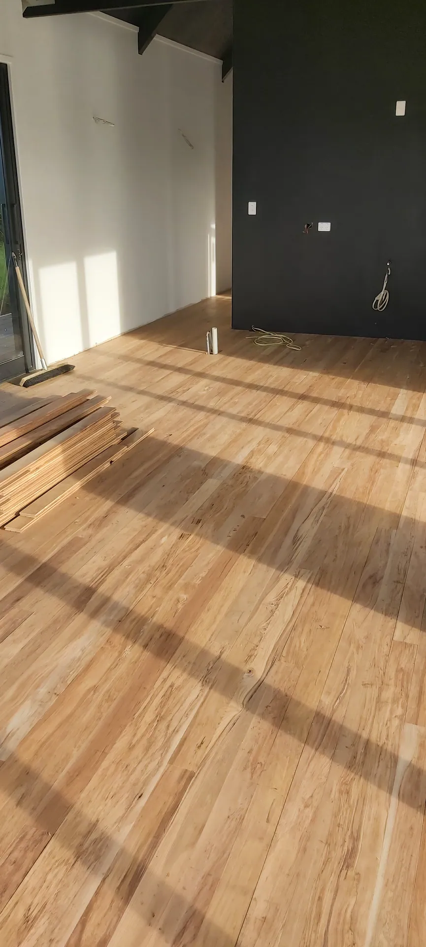 New golden timber floor in a fresh build.