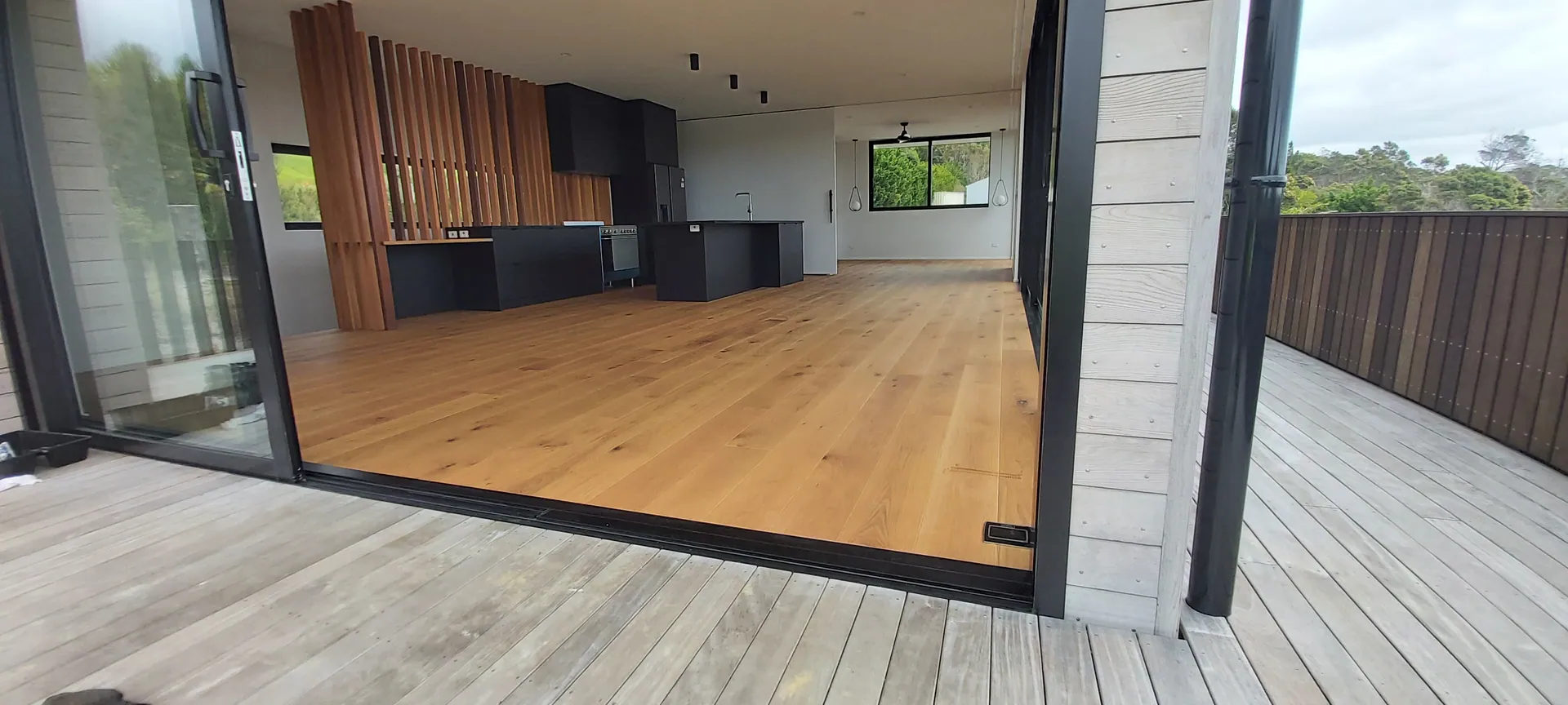 Oak floor seen from the deck of a modern home.