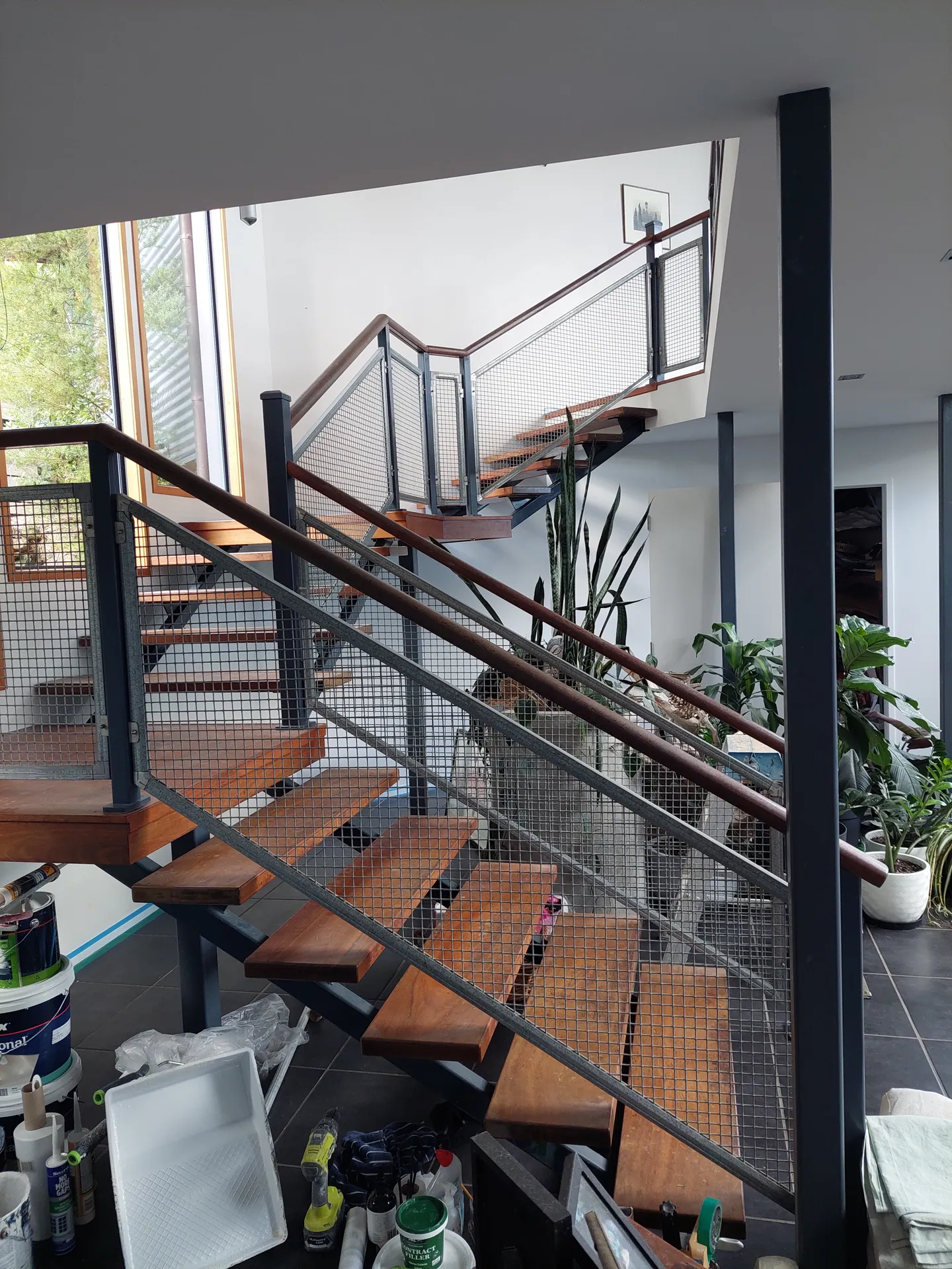 Open timber treads on a steel stringer.