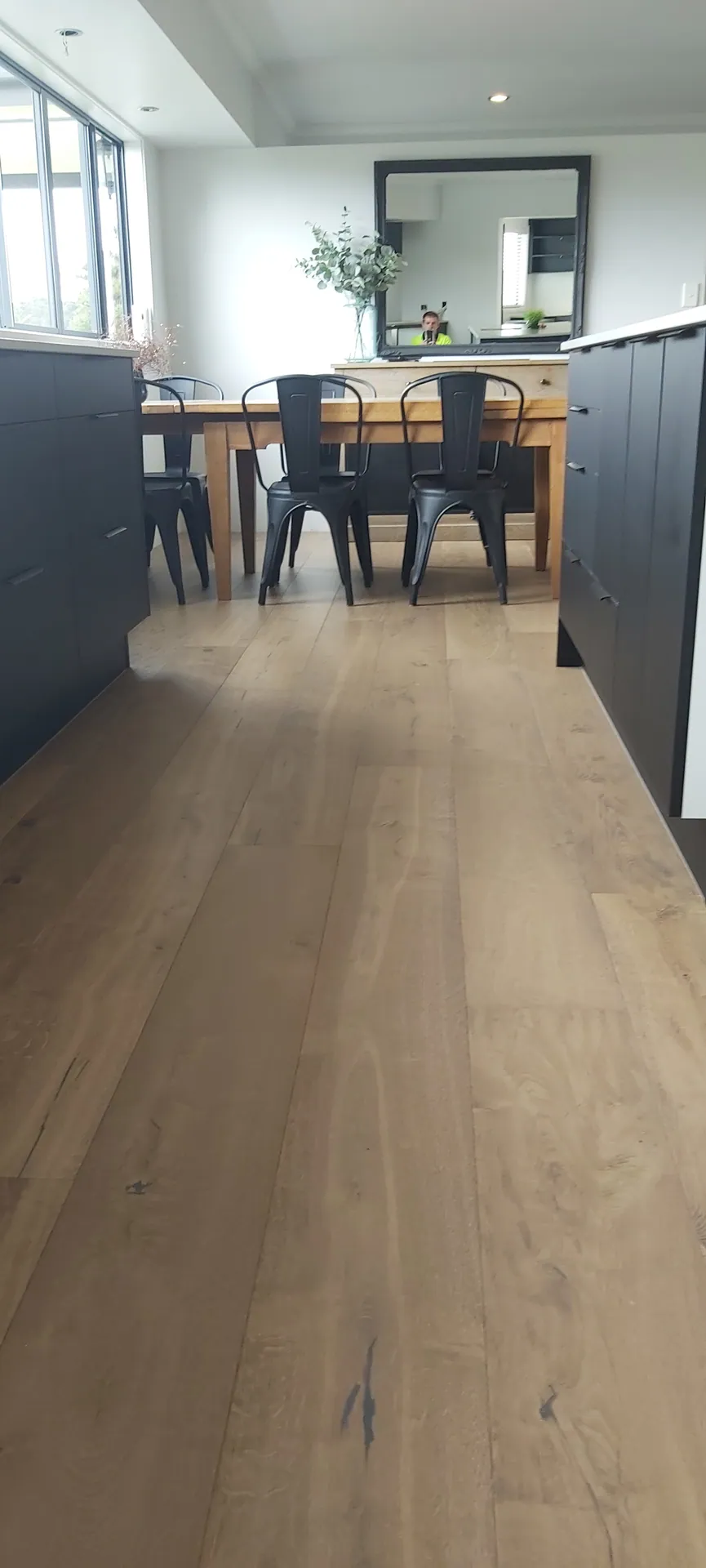 Wide oak floor from kitchen to dining.